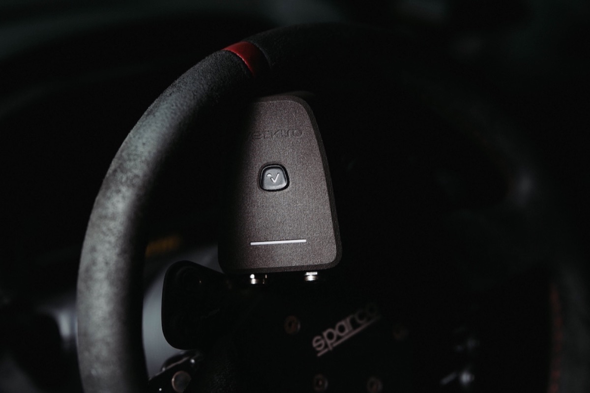 VetkuroGPS mounted on a Sparco steering wheel in the cockpit